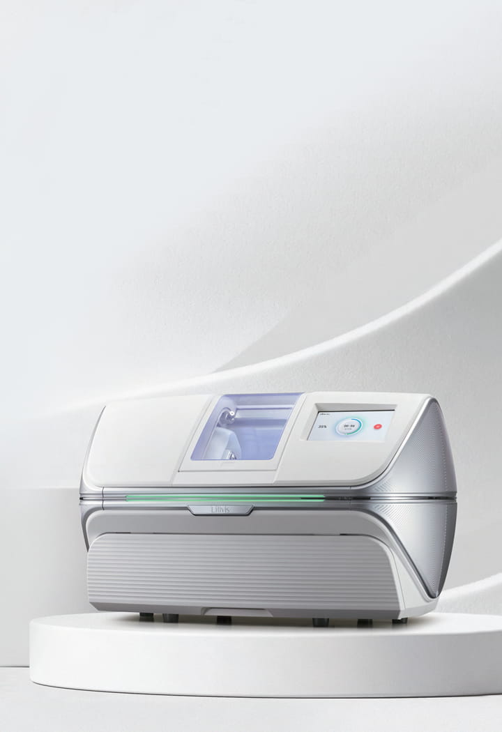Lilivis dental milling machine displayed on a white podium.